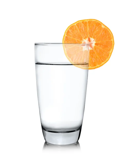 Glass of water with orange fruit — Stock Photo, Image