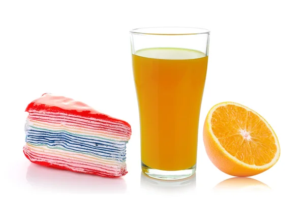 Krep, čerstvý pomeranč a sklenice s džusem — Stock fotografie