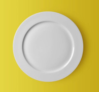 Sarı zemin üzerinde beyaz seramik plaka