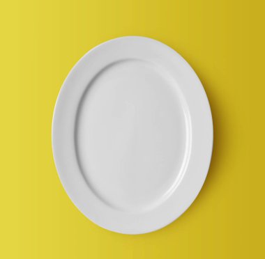 Sarı zemin üzerinde beyaz seramik plaka