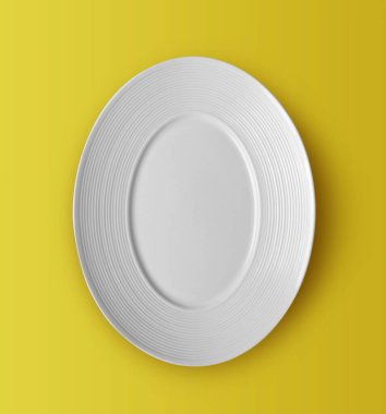 Sarı zemin üzerinde beyaz seramik plaka