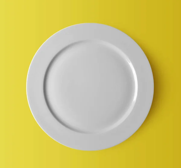 White Ceramic Plate Yellow Background — Stock Photo, Image