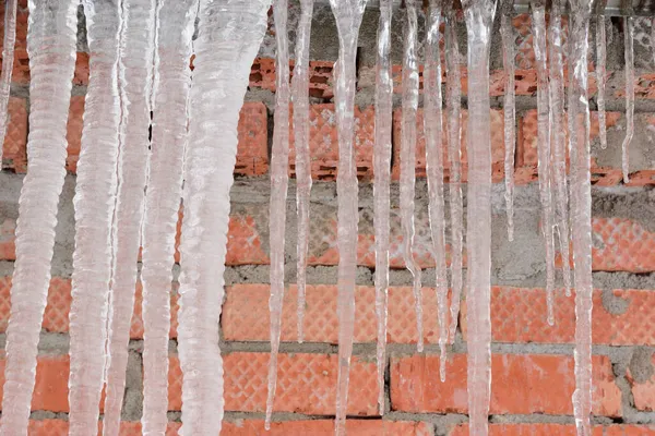 Long Thick Icicles Hanging Roof Wall Made Red Bricks Visible — Stock Photo, Image