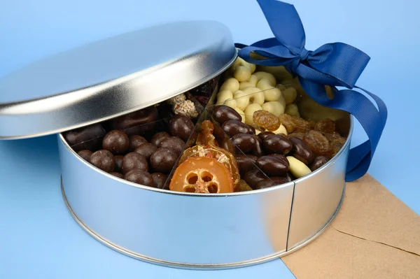 Metal Gift Box Dried Fruits Chocolates Image Light Blue Background — стоковое фото