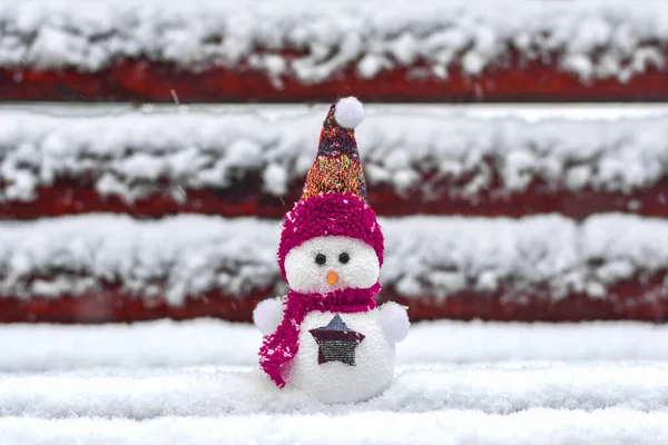 Hello Winter. cute snowman on winter background. Holiday winter season.  creative idea for season greeting Merry Christmas or Happy New Year. soft  focus Stock Photo