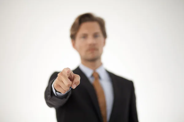 Smiling Young Businessman Pointing at the Camera — Stock Photo, Image