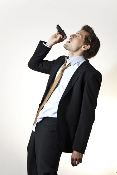 Drinking businessman — Stock Photo, Image