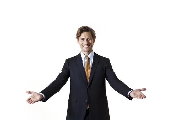 Empresário sorridente dizendo bem-vindo — Fotografia de Stock