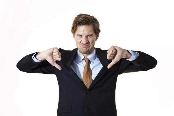 Unhappy businessman giving thumbs down — Stock Photo, Image