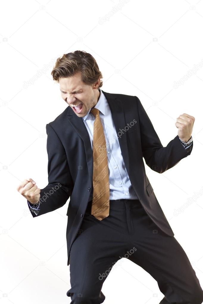 Businessman screaming in victory