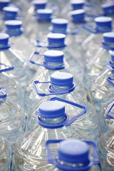 Diverse bottiglie di acqua normale Fotografia Stock