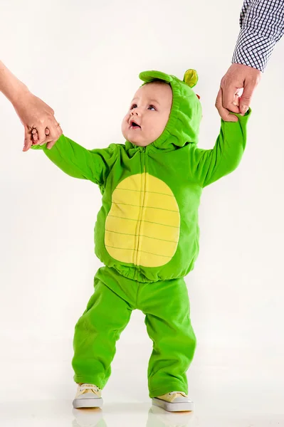 Małe dziecko w garniturze smoka — Zdjęcie stockowe