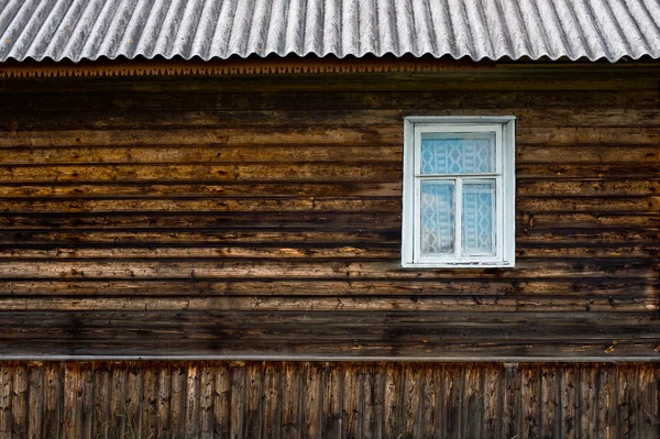 Wooden wall with window — Stock Photo, Image