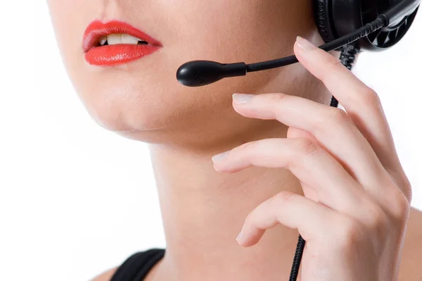 Close-up shot of a hotline worker speaking into a microphone — Stock Photo, Image
