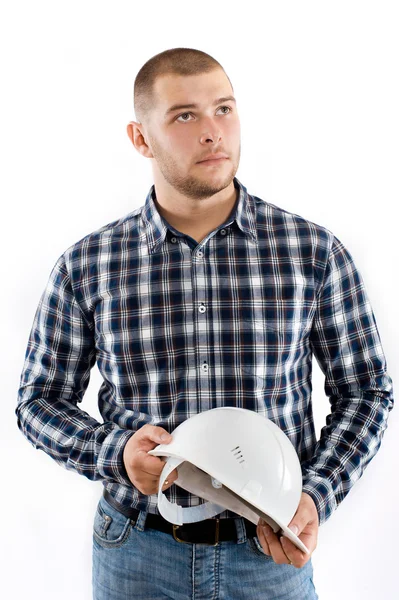 Construction worker holding hardhat — Stock Photo, Image