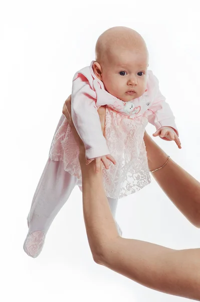 Mãe segurando doce filha — Fotografia de Stock