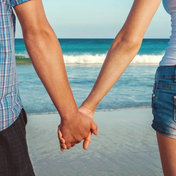 Lovers couple holding hands — Stock Photo, Image