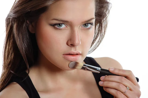 Beautiful woman applying cosmetic. Make-up — Stock Photo, Image