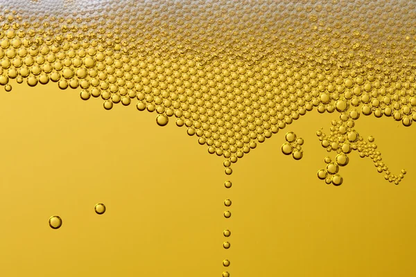 Пузыри и пена в пиве — стоковое фото