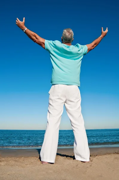 Happy and successful man with open arms — Stock Photo, Image