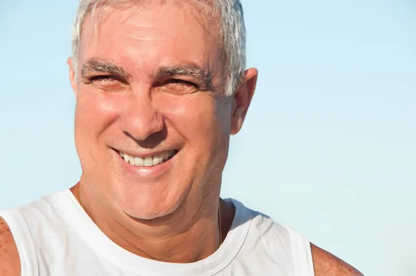 Happy and successful man cheering outdoors — Stock Photo, Image