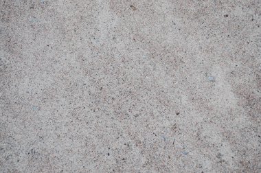 Taşın arka plan dokusu, kum, koyu noktalar ve açık arkaplanda çizgiler. Yumuşak pastel tonlu duvar kağıdı tasarımı. grunge 