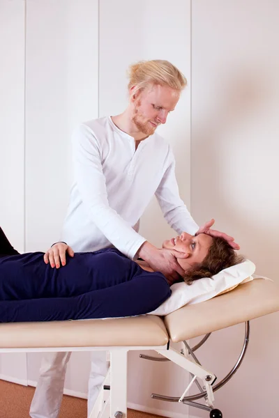 Practitioner Manipulating Patient's Neck — Stock Photo, Image