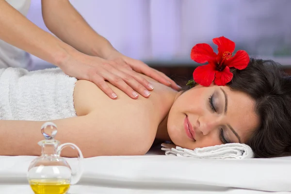 Woman getting a back massage. — Stock Photo, Image