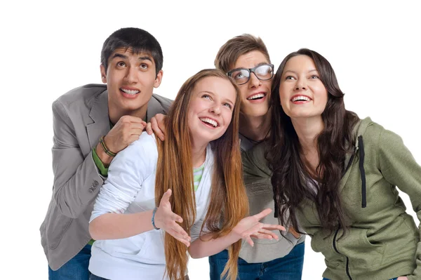Grupo de jóvenes amigos divirtiéndose y mirando hacia arriba Imagen De Stock