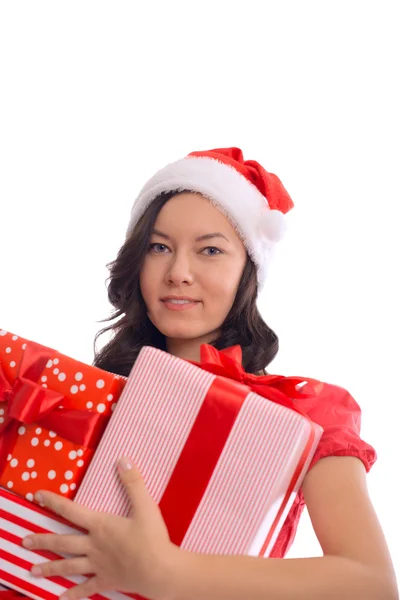 Young happy girl in Christmas Santa hat holding christmas gift — Stock Photo, Image