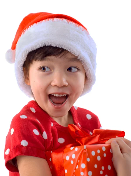 Felice simpatica bambina in Natale cappello di Babbo Natale — Foto Stock