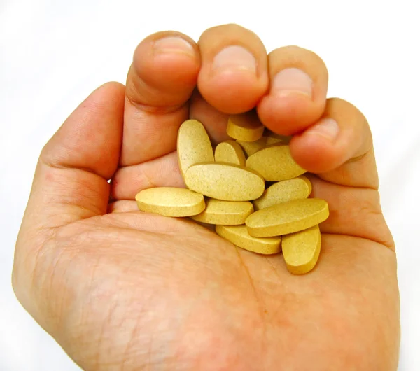 Tabletten, Medikamente zur Hand — Stockfoto