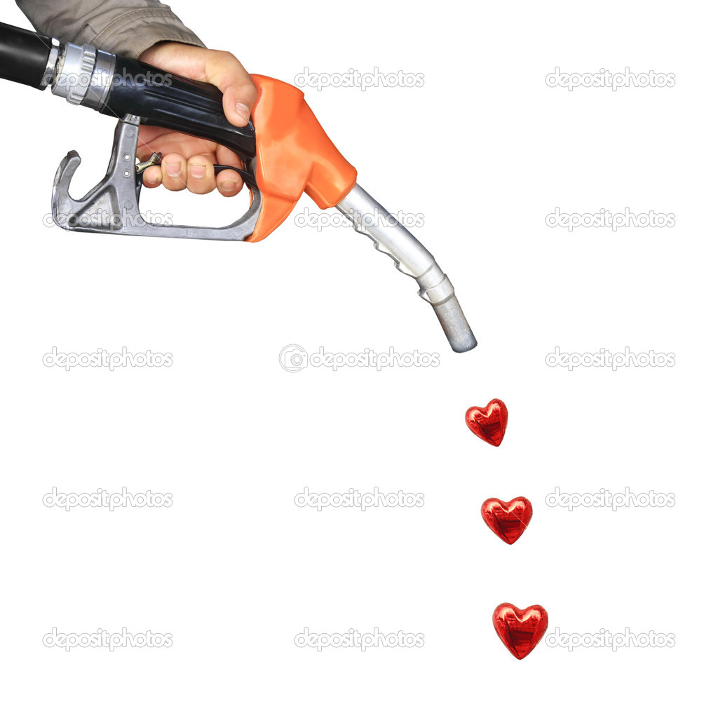 Male hand holding gas pump and red heart drop