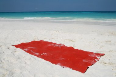 Red towel on beatiful beach, Tachai island, Similan island group clipart