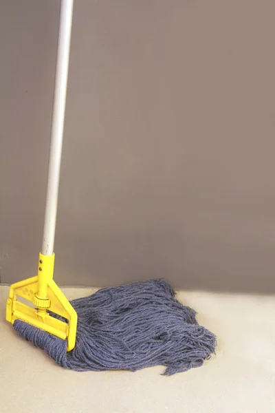 Mop on wall — Stock Photo, Image