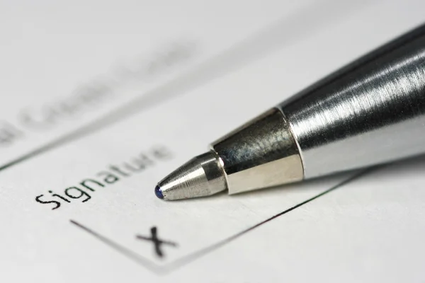 Metal pen signature on paper — Stock Photo, Image
