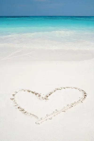 Hearts drawn in beach Stock Picture