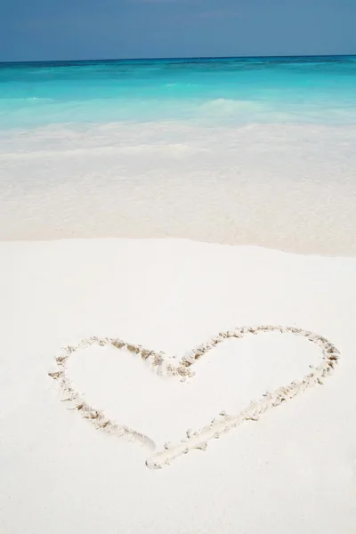 Hearts drawn in beach Royalty Free Stock Photos