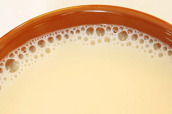 Burbuja de aire en taza de leche — Foto de Stock