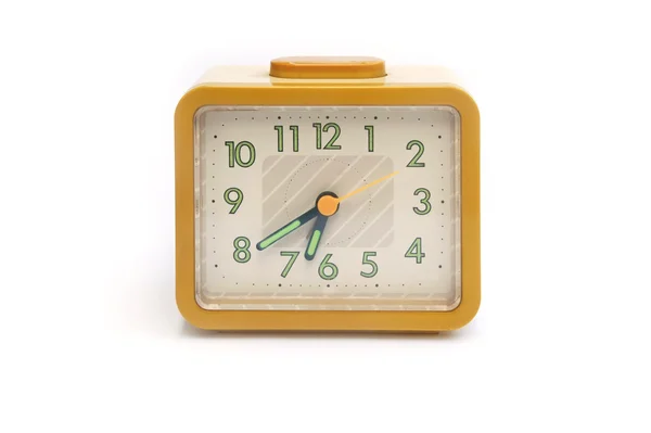 Żółty zegar na białym tle — Zdjęcie stockowe