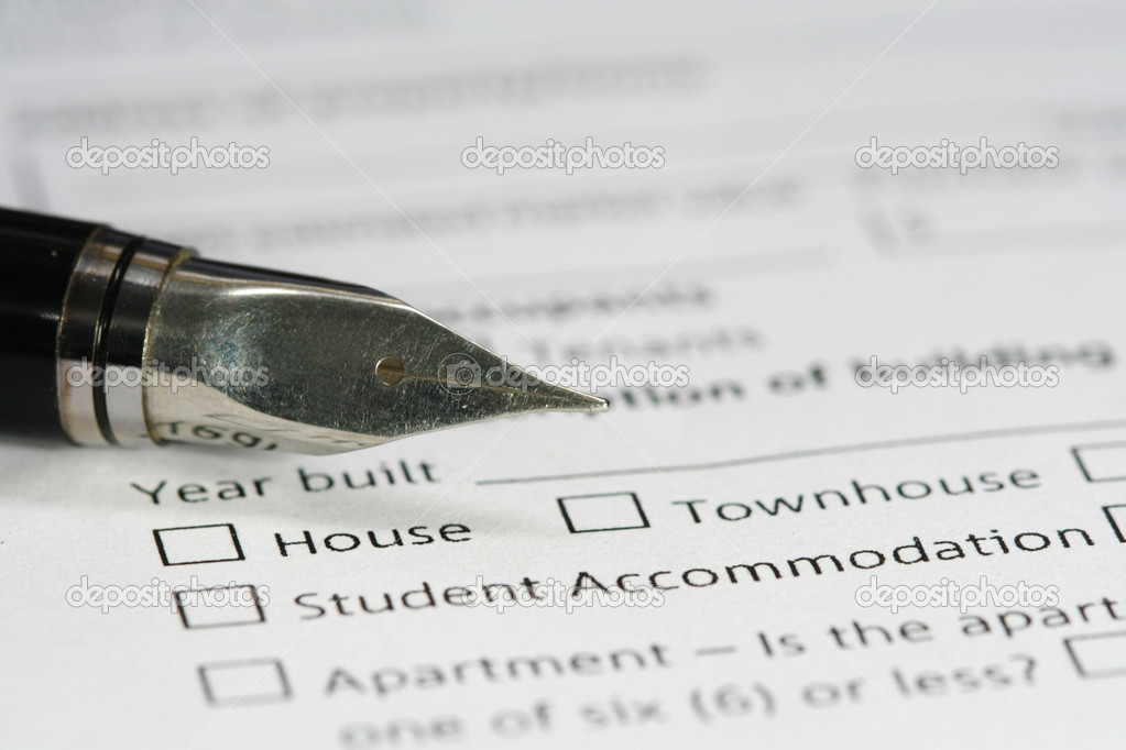 pen on housing document paper