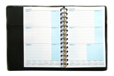 beyaz arkaplanda dizüstü bilgisayar ve kalem