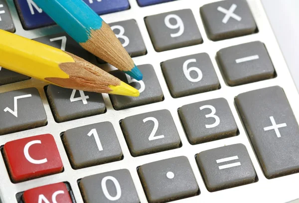 Pencil and calculator — Stock Photo, Image