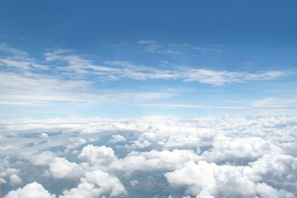 Blue skyfrom airplane window — Stock Photo, Image