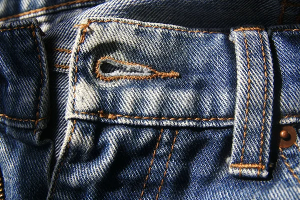 Botão de buraco de calça jeans — Fotografia de Stock