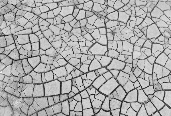 Трещины почвы в реке, текстура — стоковое фото