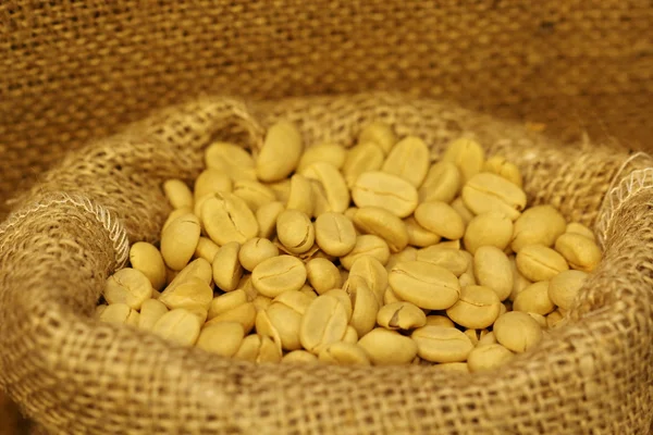 Coffee bean in sack bag, before roast — Stock Photo, Image