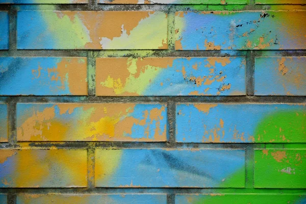 Urban wall with colorful graffiti — Stock Photo, Image