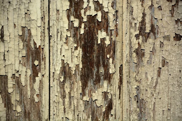 Peeling paint on grunge wooden surface — Stock Photo, Image
