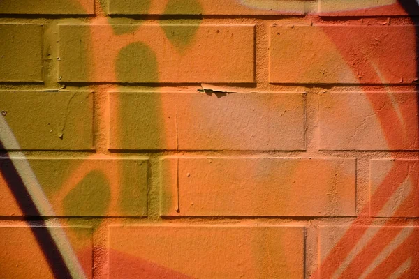 Old brick wall colorful graffiti — Stock Photo, Image